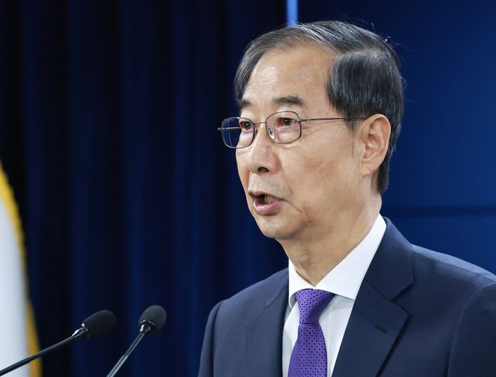 韩国代理总统韩德洙辞职，原因是…