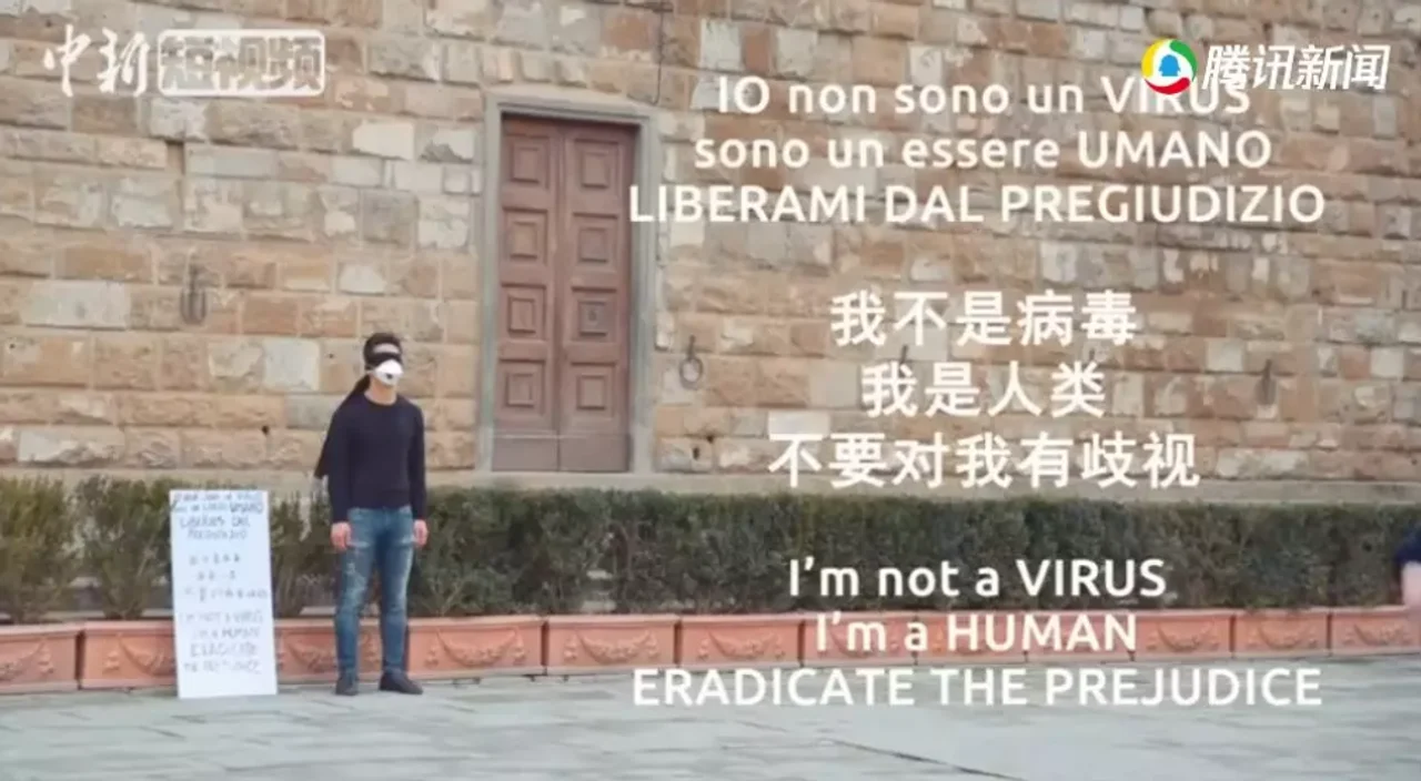 “我不是病毒” !意大利华人小哥戴着口罩走上街头...