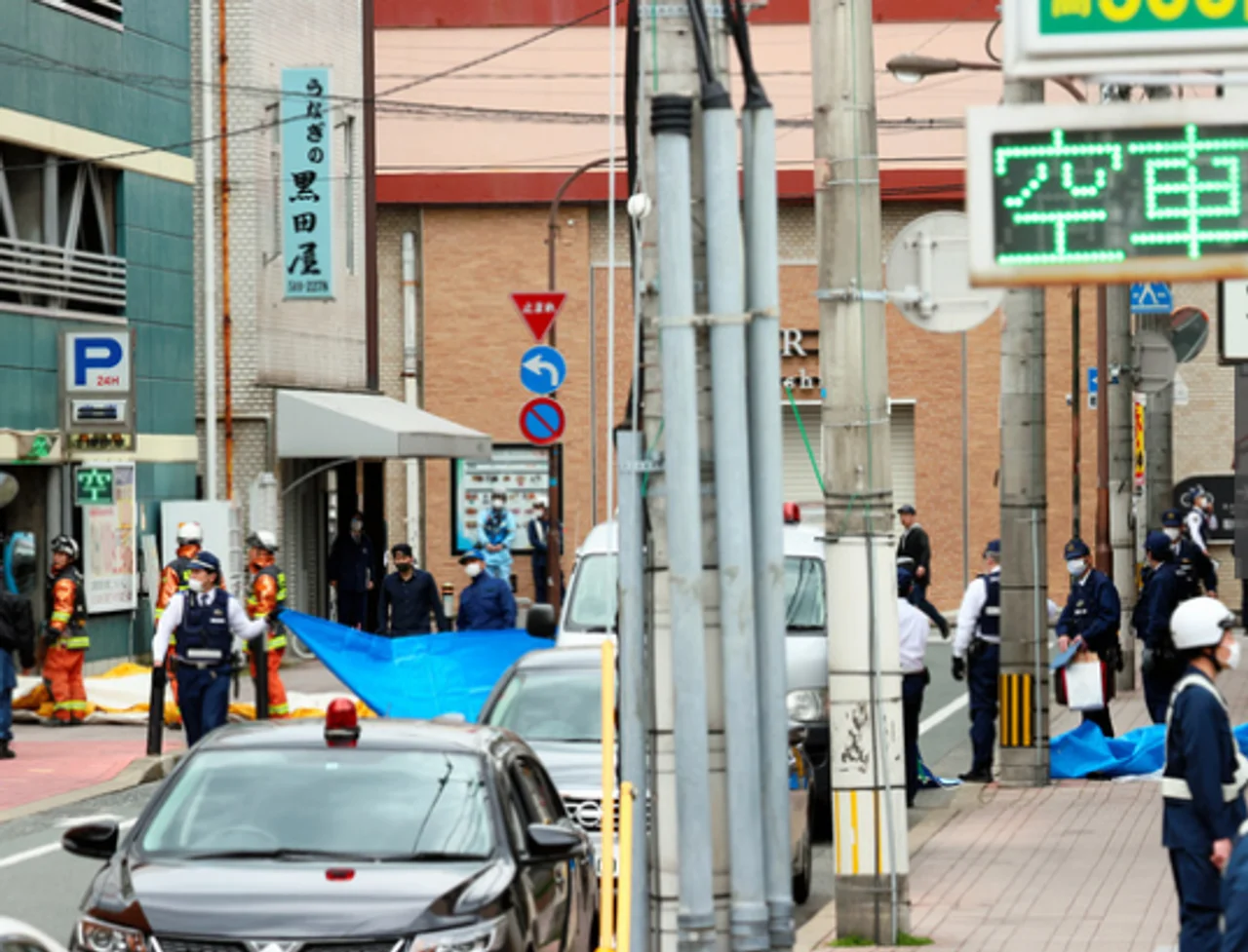 日本男子持刀劫持两名儿童 遭大批警察围堵(图)