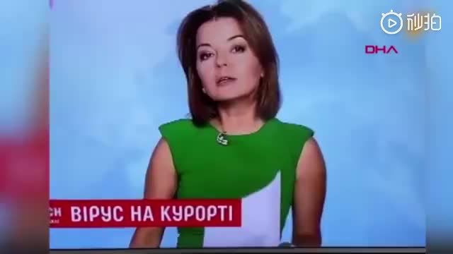 乌克兰主持人直播时门牙突然掉了，淡定捂嘴拿掉继续播报
