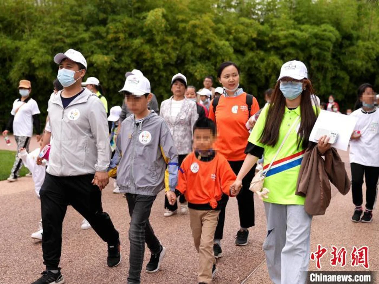 全国助残日:70组特殊孩子家庭西安健步走