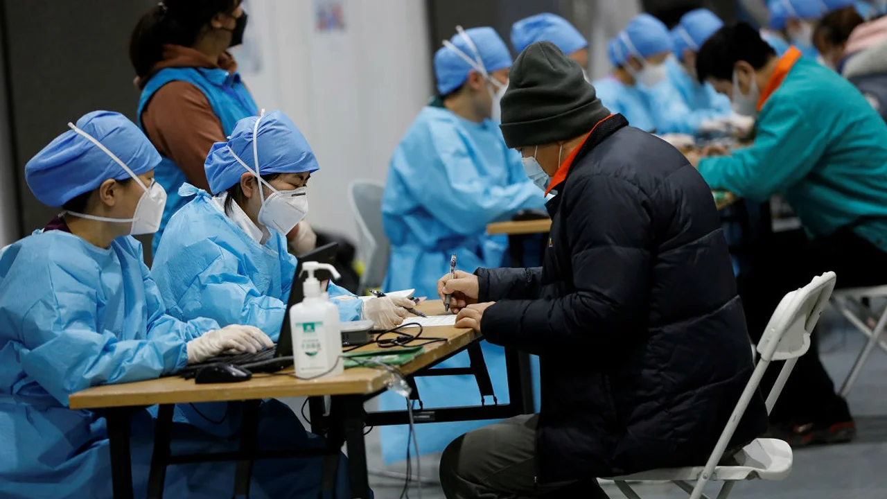外媒走访北京疫苗接种点 中国加快打造“免疫长城”