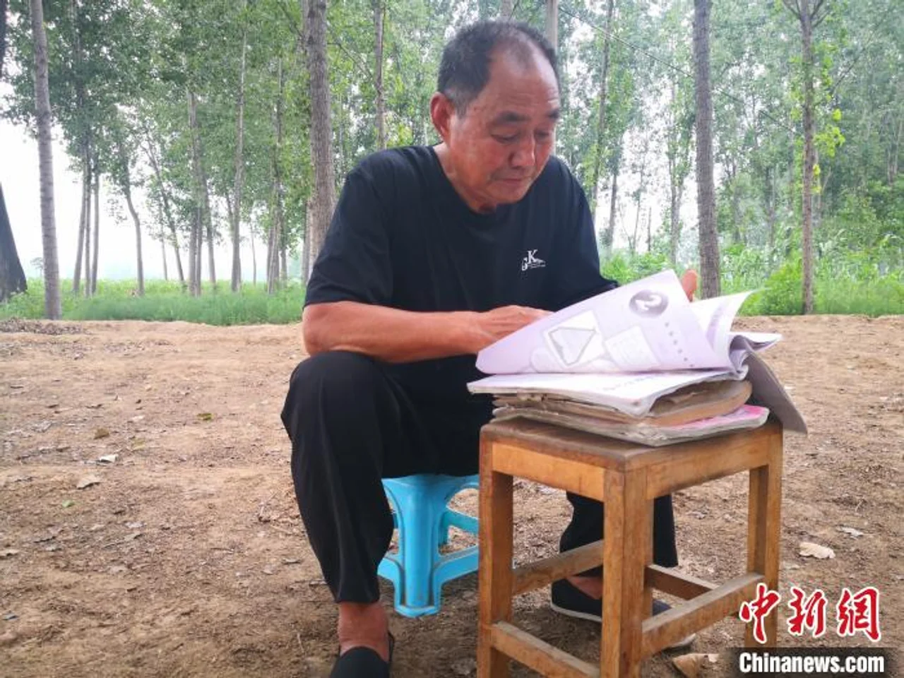 古稀老人“五战”高考:今年过线就上 收笔入“鞘”