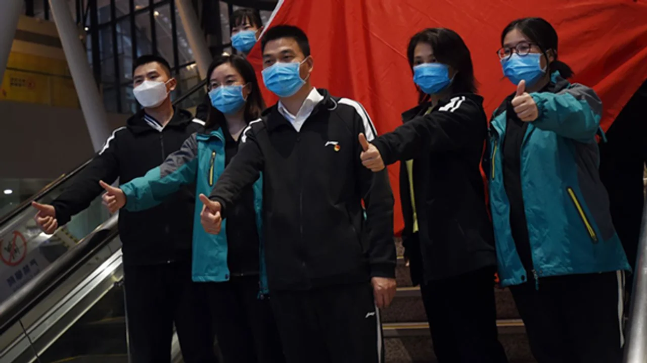 西媒:中国向世界证明 隧道尽头光明犹在