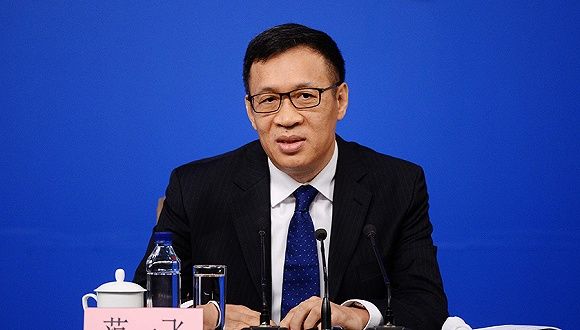 范一飞：对疫情防控重点地区回笼现金，消毒后存放14天以上再投放市场