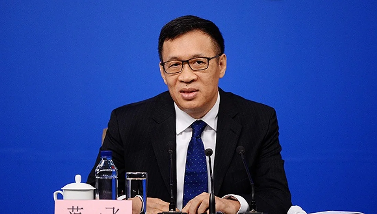 范一飞:对疫情防控重点地区回笼现金,消毒后存放14天以上再投放市场