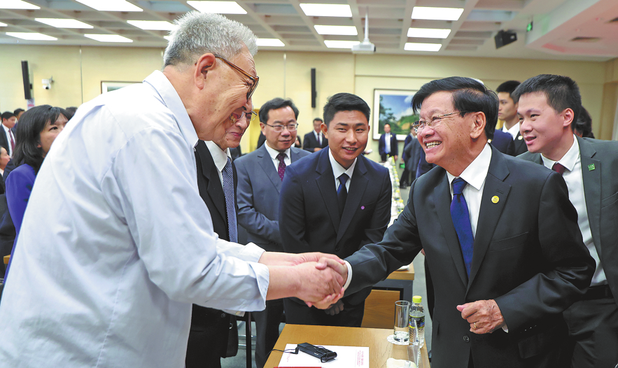 Thongloun revisits his alma mater in Beijing